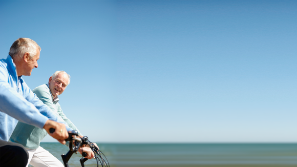 Image of two men biking - to be used with LoFric Origo / BPE campaign